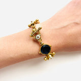 PULSERA CHI GRANATE