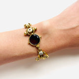 PULSERA CHI GRANATE